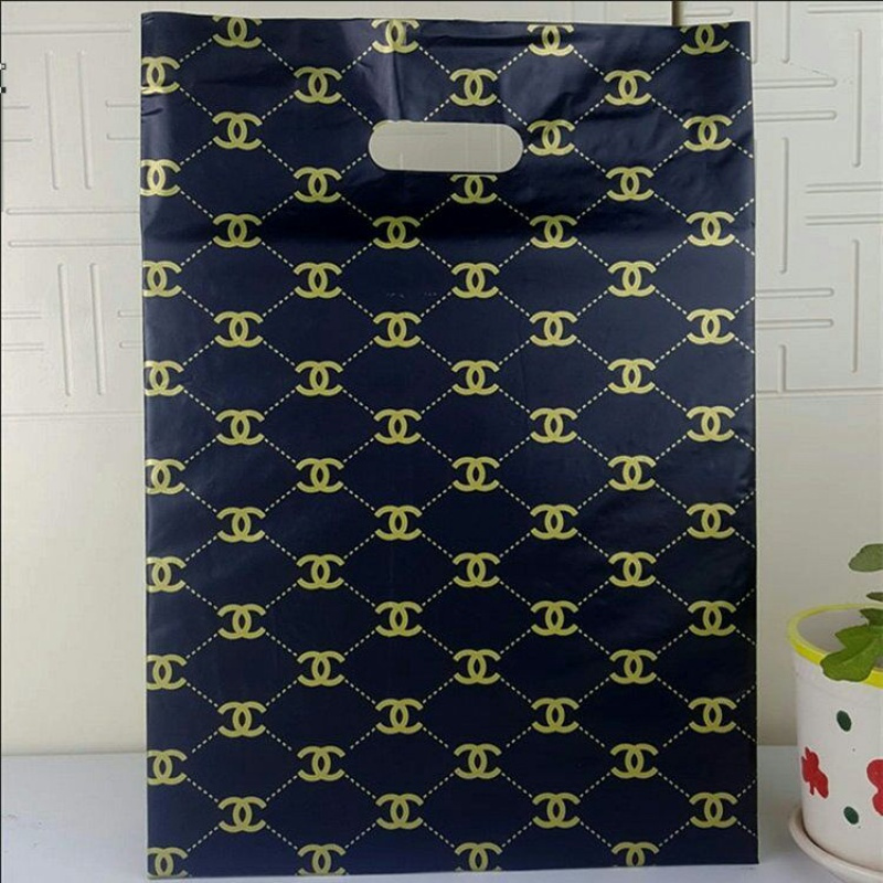 100个特价款服装店袋子塑料礼品包装袋购物袋装衣服袋子批发香奈儿100