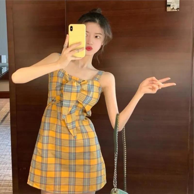 大码宽松显瘦连衣裙新款夏季网红格子少女学生减龄时尚仙女吊带裙莎丞