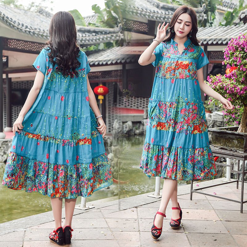 2018夏季民族风女装中长款短袖连衣裙气质印花宽松裙子桔红色均码