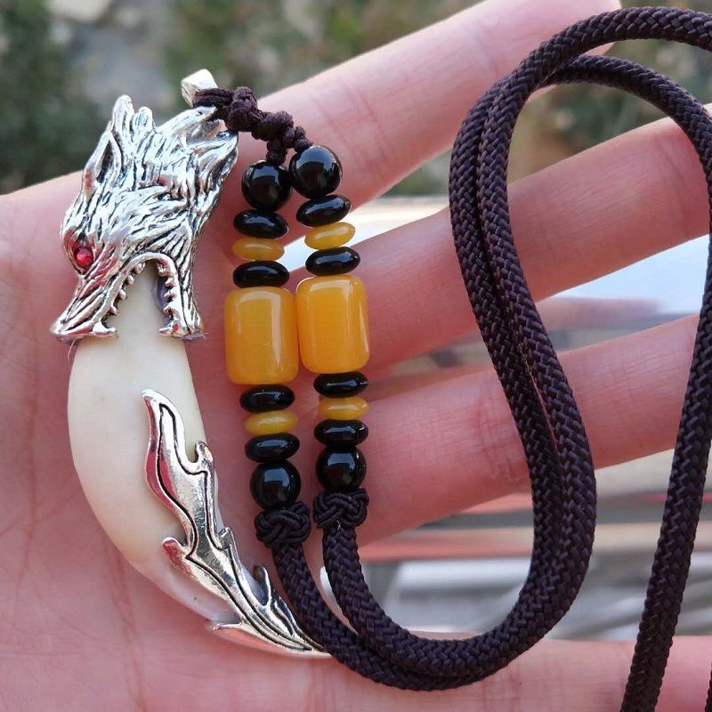 狼牙黑狗牙吊坠项链真藏獒牙齿狼牙形男女时尚挂件本命年个性饰品红眼