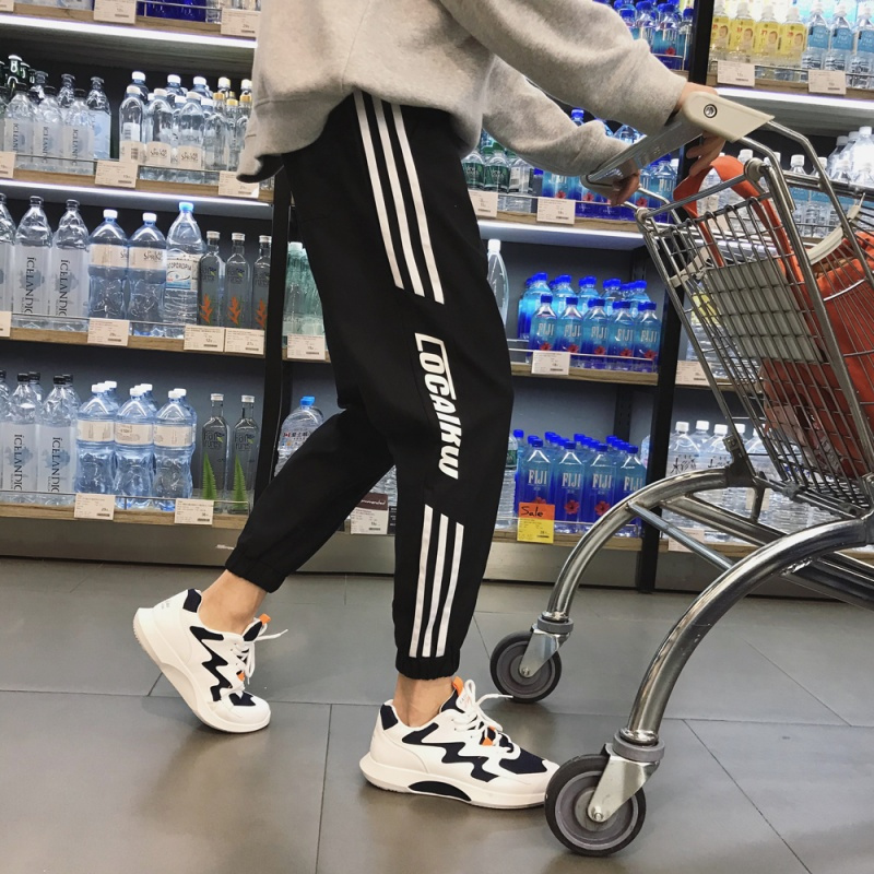 潮个性的裤子日韩风情侣装休闲裤春夏薄款织带拼接字母束脚裤