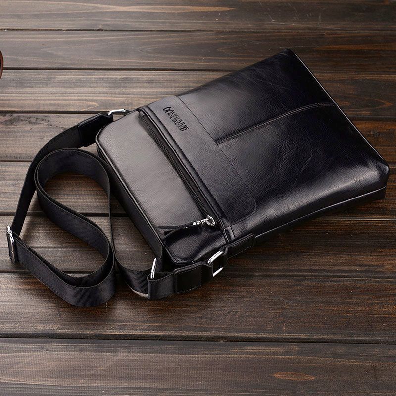 袋鼠男包单肩包斜挎包男士皮包商务休闲包包潮流竖款背包男公文包黑色