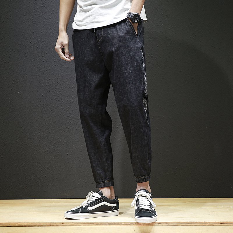 2018夏季年轻九分牛仔裤男士加肥大码宽松小脚哈伦裤韩版潮男裤子