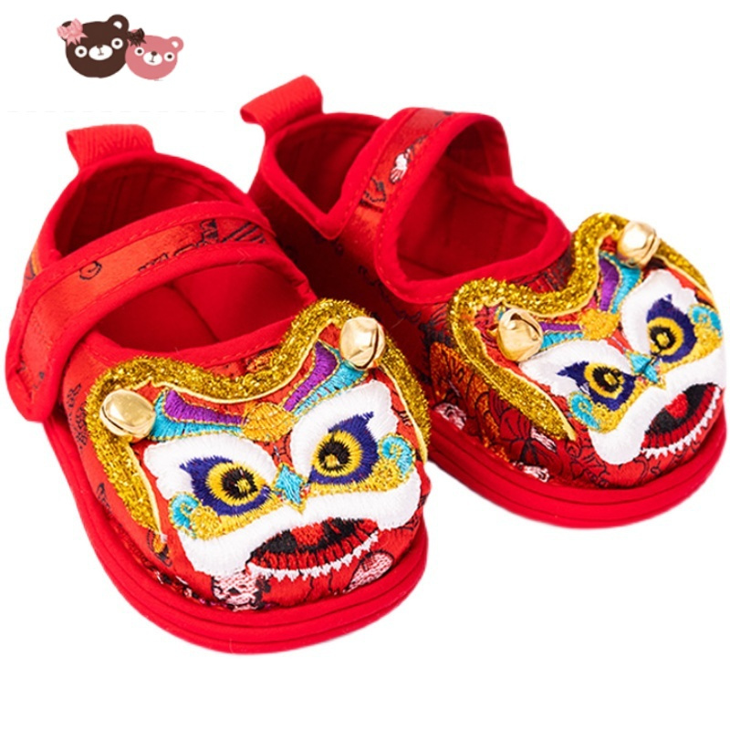 绿彩虹光新款宝宝醒狮虎头鞋男女童周岁百天千层底刺绣学步鞋铃铛防滑