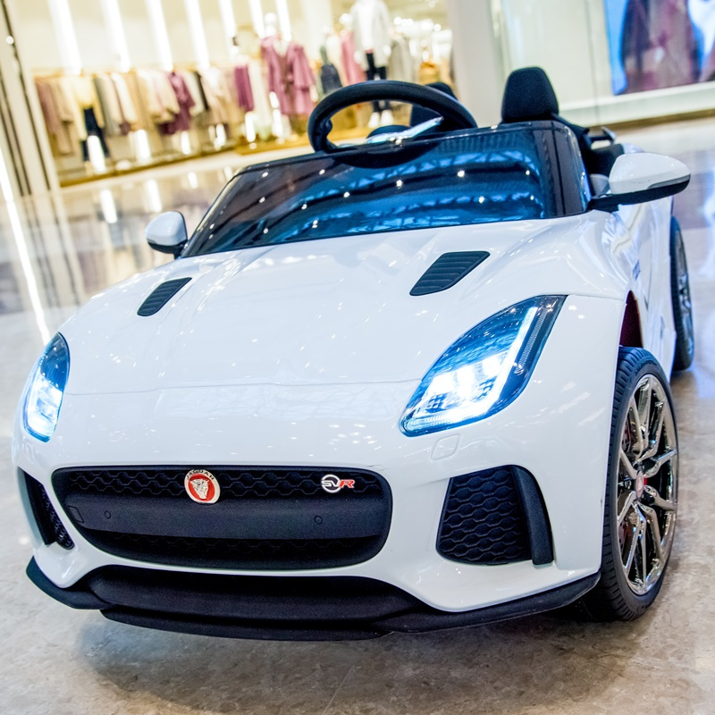 新捷豹儿童电动跑车四轮带遥控可坐人小孩摇摆童车宝宝玩具车轿车视频