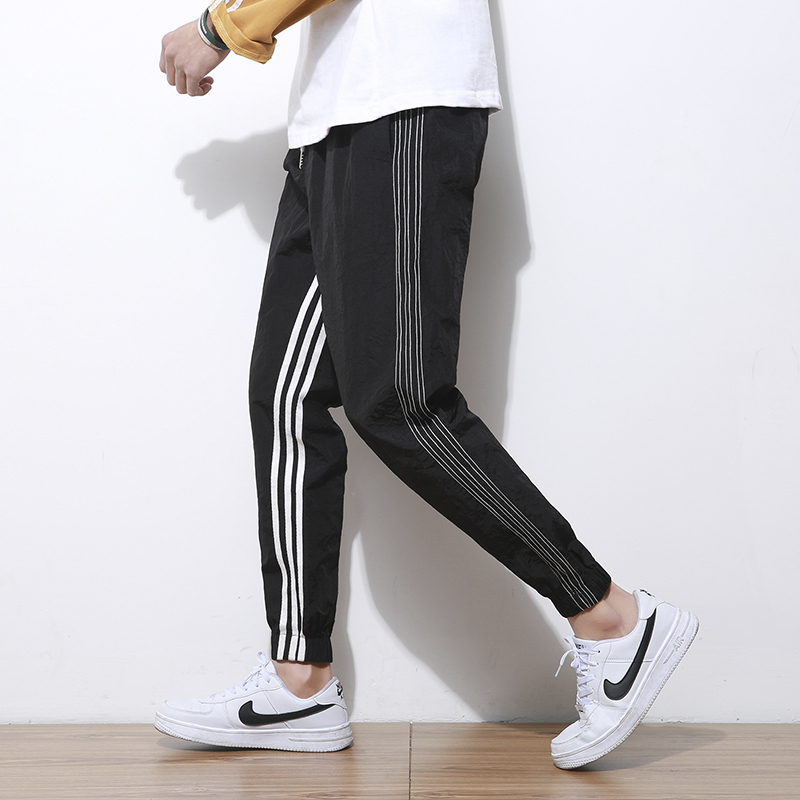 裤子男韩版时尚春夏款九分小脚休闲裤学生修身条纹束脚运动哈伦裤