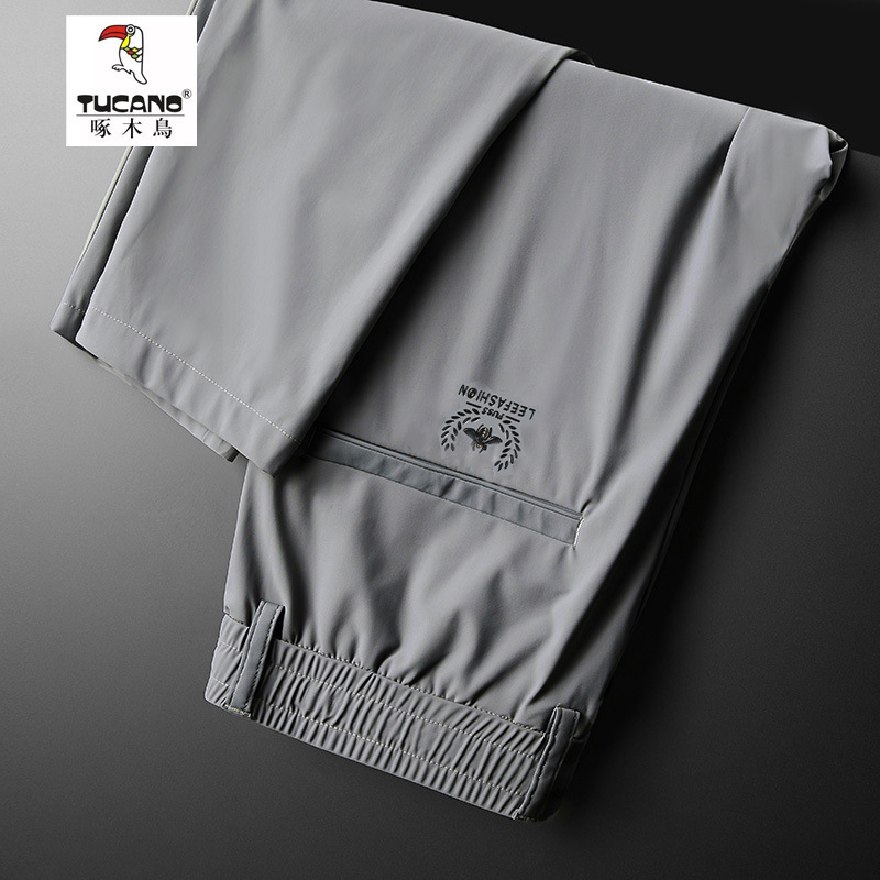 啄木鸟冰丝速干薄款弹力拉链口袋夏季休闲裤直筒耐磨男士冰感长裤高清大图