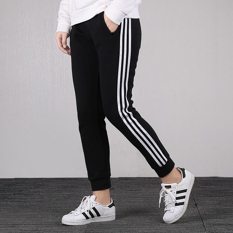 Adidas阿迪达斯裤子女2020新款运动裤收口宽松长裤女裤FM9309