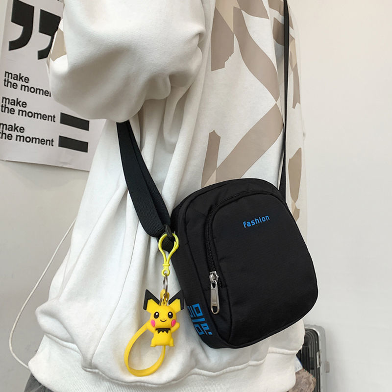 ins潮牌小挎包男士简约斜挎包女休闲日系轻便单肩斜跨手机包高清大图