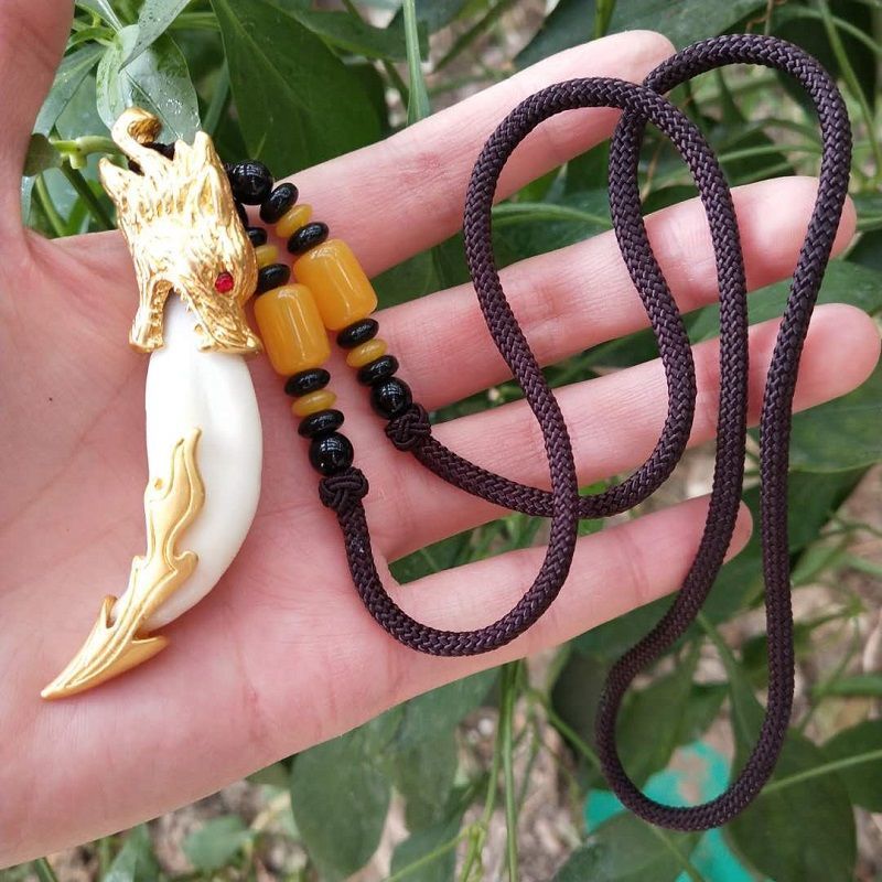 狼牙黑狗牙吊坠项链真藏獒牙齿狼牙形男女时尚挂件本命年个性饰品红眼