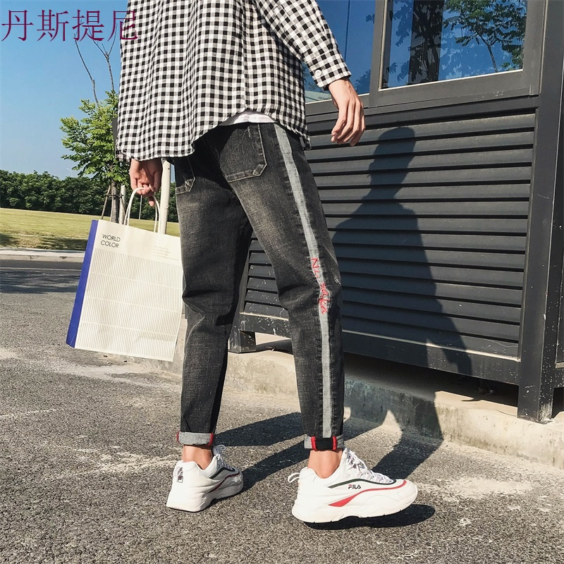 秋季新款牛仔裤男宽松大码弹力小脚潮流哈伦裤日系学生复古长裤子