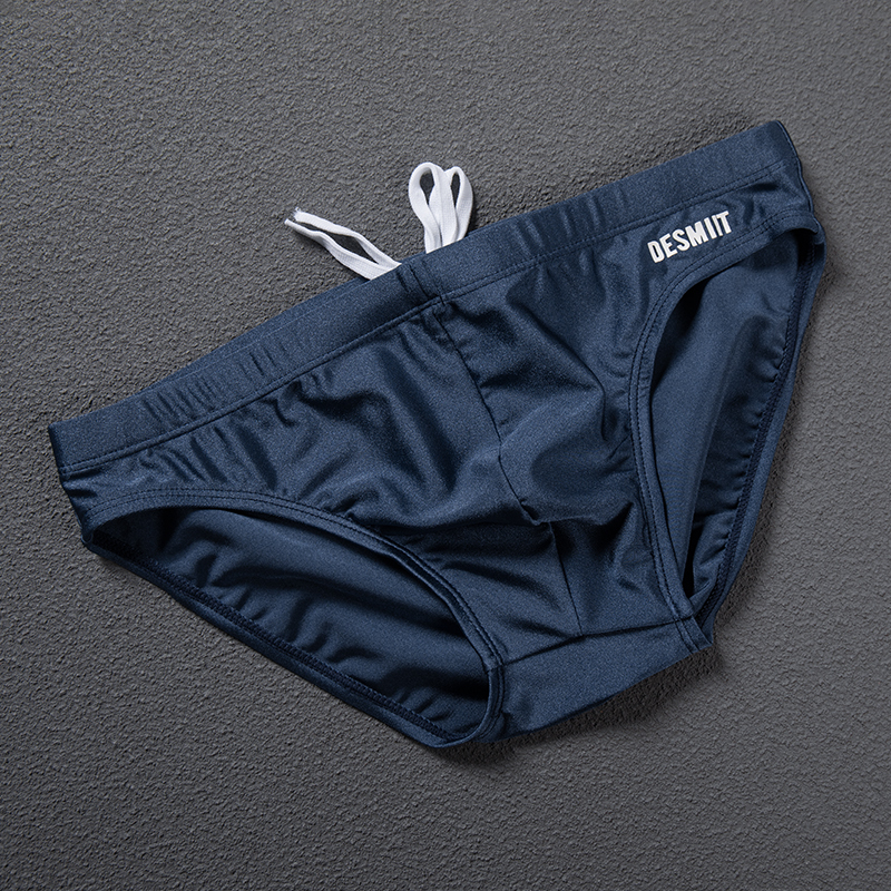 新款泳裤男潮牌低腰性感三角裤纯色显大海边游泳泡温泉男士泳衣