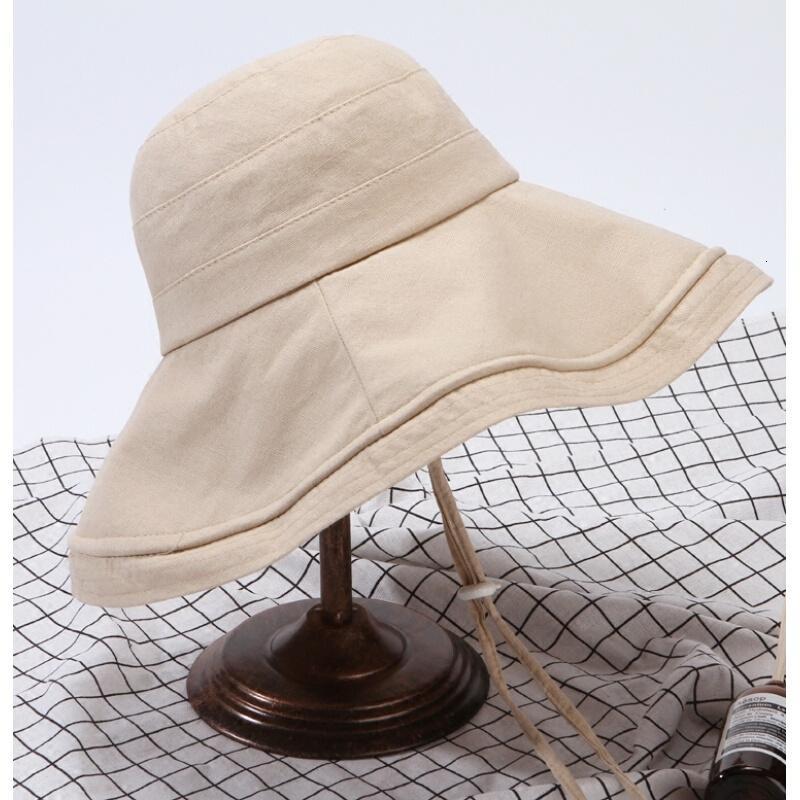日系棉麻防风绳纯色大檐渔夫帽子女休闲百搭夏季遮阳帽可折叠盆帽米色