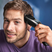 飞利浦(Philips)理发器 家用电推剪 钛合金刀头 配3把修剪梳齿 刀头水洗 触屏控制 HC9450/15