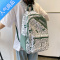 封后书包女初中生涂鸦大容量韩版ins风中学生背包男新款小学生双肩包学生书包