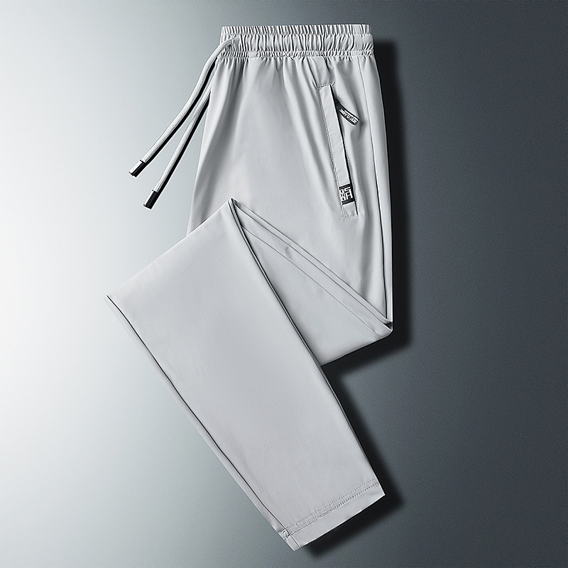啄木鸟男士2025夏季新款冰丝速干透气裤子舒适百搭宽松裤休闲长裤高清大图