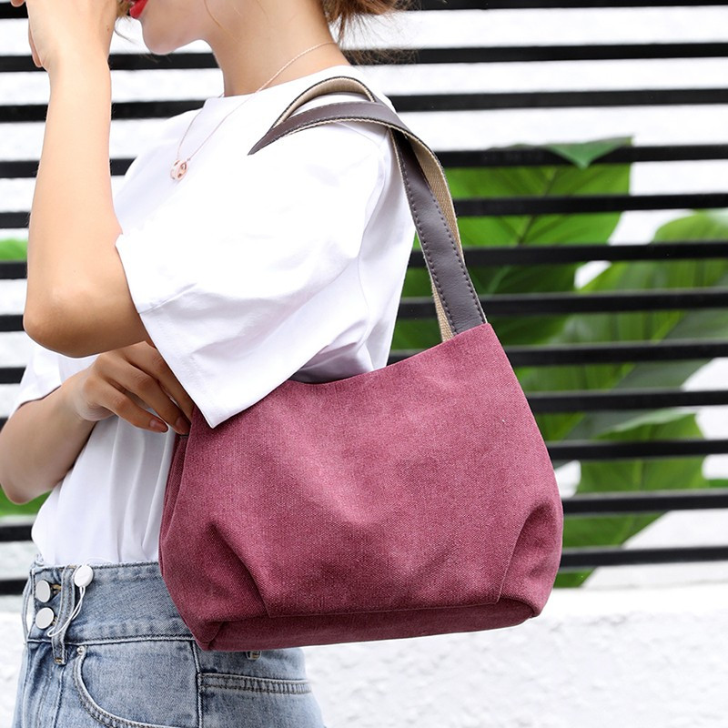 肩手提纯色简约轻便布袋布兜女手拎手腕上班包小背包时尚休闲女士布包
