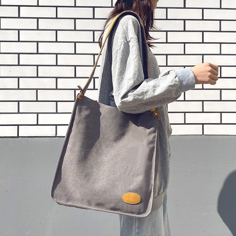 单肩斜挎手提帆布袋布兜纯色简约时尚休闲学生上课书包大容量女士包包