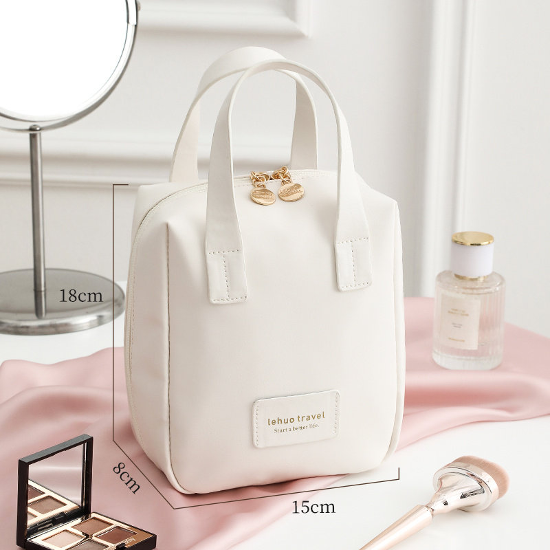 化妆包女2025新款高端大容量便携式护肤品收纳旅行洗漱袋手提 奶油白