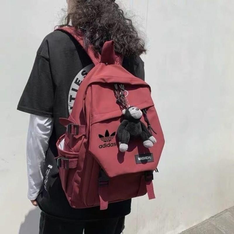 新款2021双肩包校园学生背包休闲书包男女款潮流大容量旅行背 Ad白色 无挂件