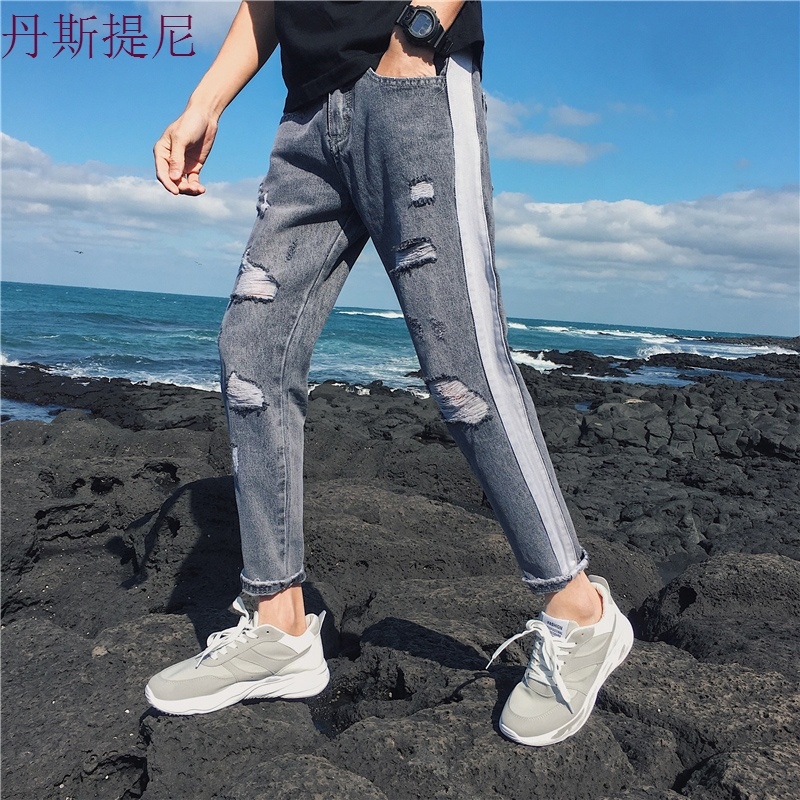 秋季新款牛仔裤男宽松大码小脚潮流哈伦裤日系学生复古破洞长裤子