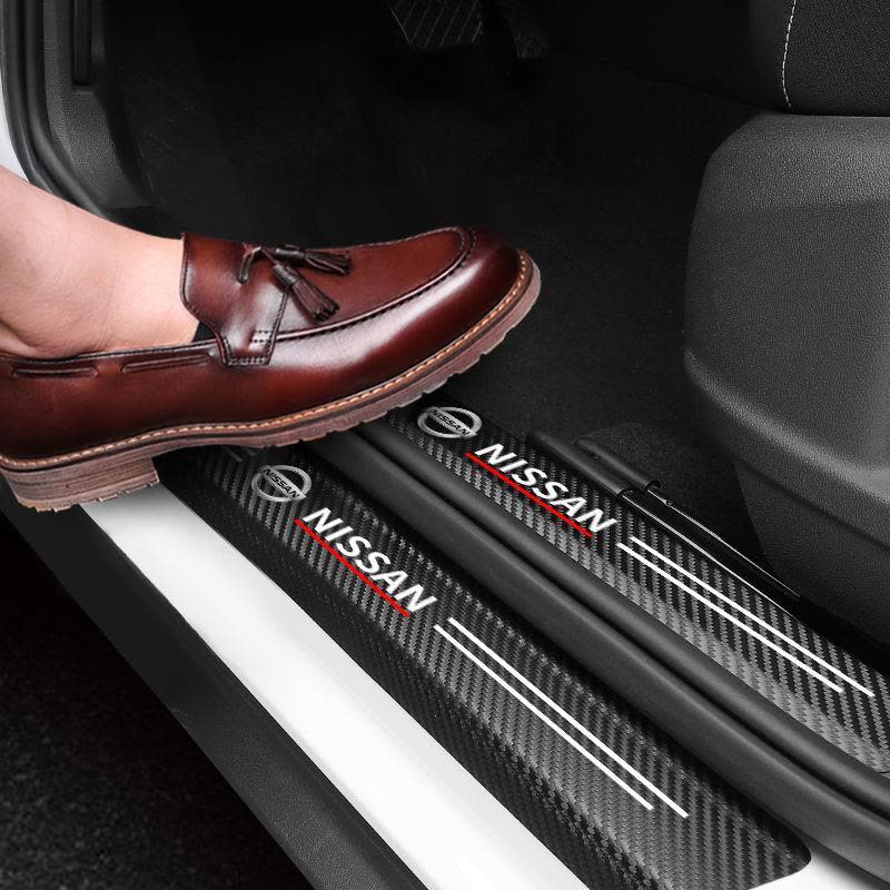 日产逍客轩逸奇骏骐达劲客天籁蓝鸟贴迎宾踏板碳纤槛条防撞条图片