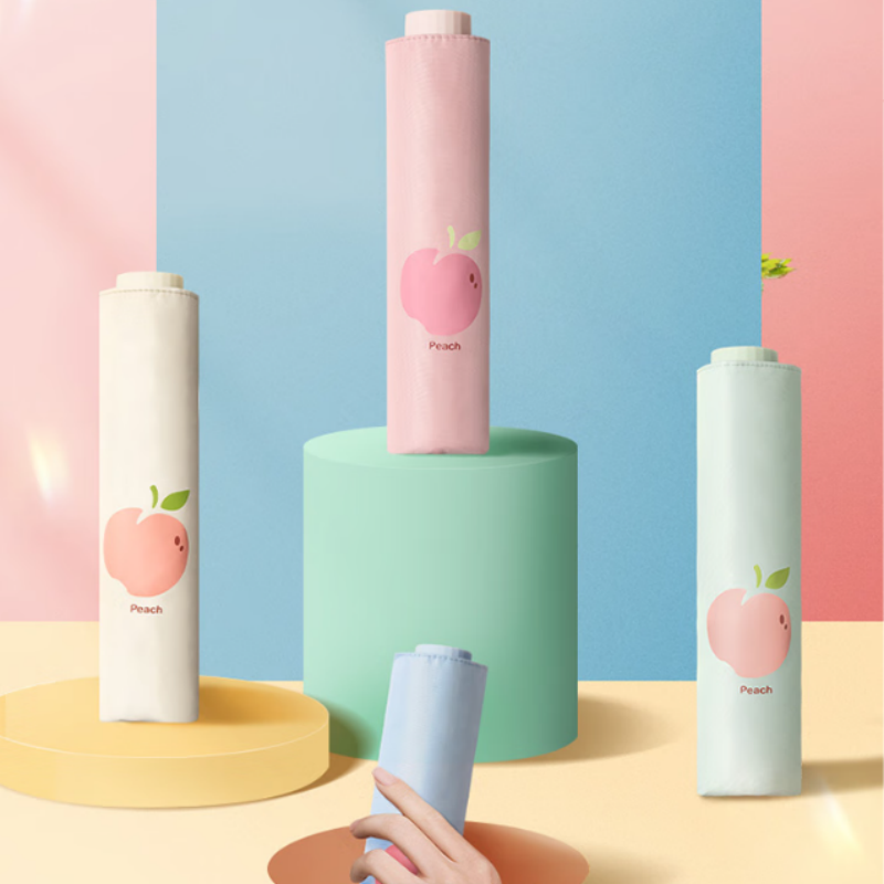 天堂防紫外线阳伞三折33755E8K伞下100CM遮阳伞黑胶防晒伞蜜桃图案晴雨伞米黄高清大图