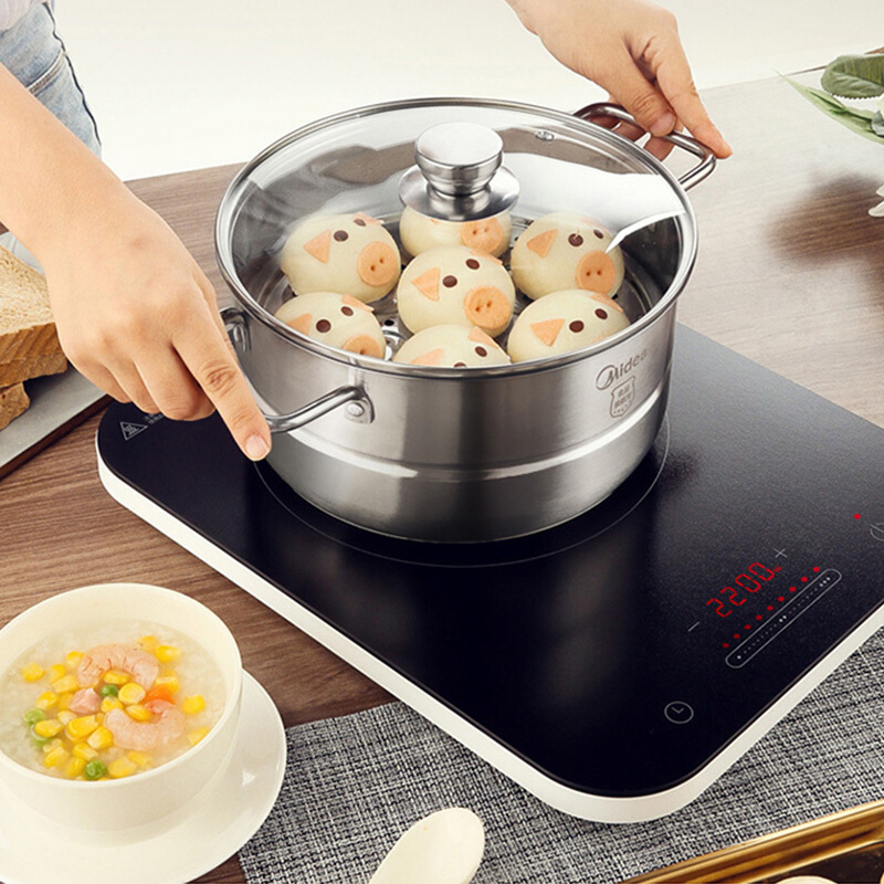 美的(Midea)电磁炉 C22-WH2237 恒匀火持续加热 大线圈盘2200W大火力 整版滑控触摸(赠汤蒸锅+炒锅