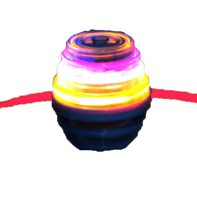 新款弹跳陀螺发光音乐弹簧陀螺带红外线夜市地摊玩具发射器