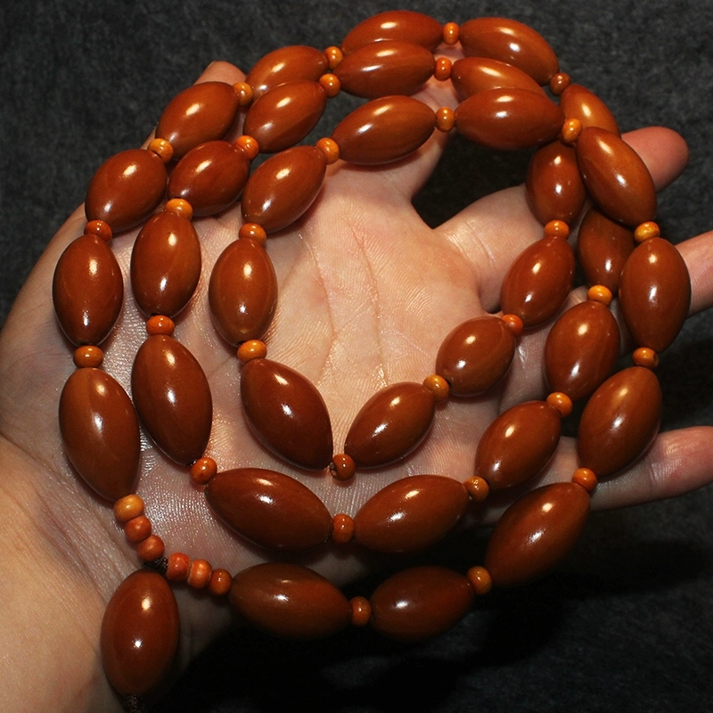 梅林老铁核12x22mm9颗20mm以上橄榄核手串光珠素核尖珠原籽脖挂长串