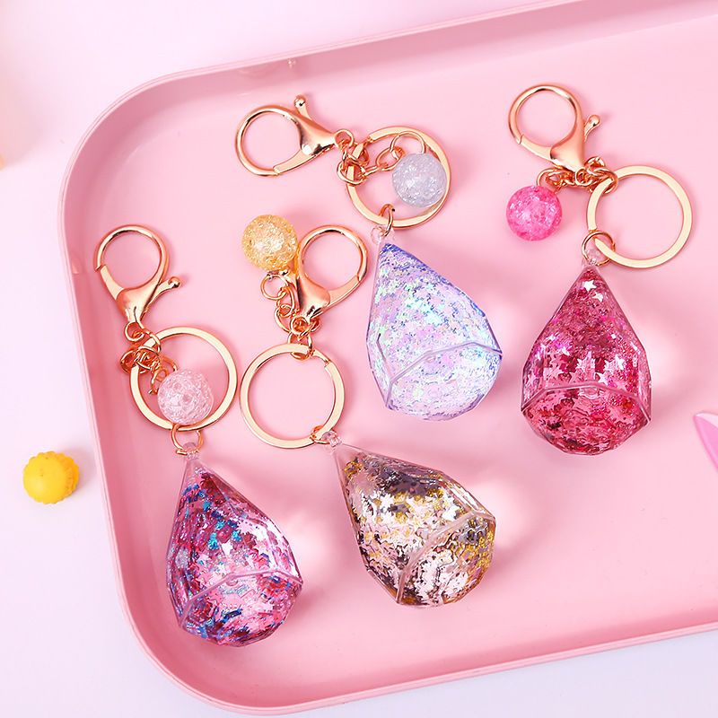 创意水晶流沙钥匙扣水滴星星闪粉可爱书包挂链汽车钥匙圈生日礼物六边