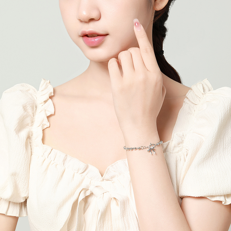 梦金园银手链女款圆珠手串甜美蝴蝶结手饰送闺蜜生日礼物