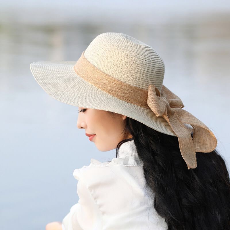 草帽春夏季时尚优雅百搭文艺蝴蝶结杏色手工编织遮阳防晒太阳帽沙滩帽