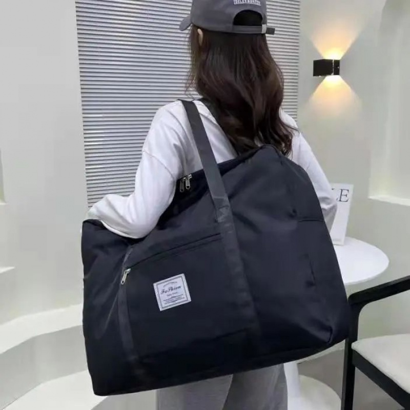 大容量旅行袋防水便携收纳袋打包行李时尚登机包商务高档旅游休闲高清大图