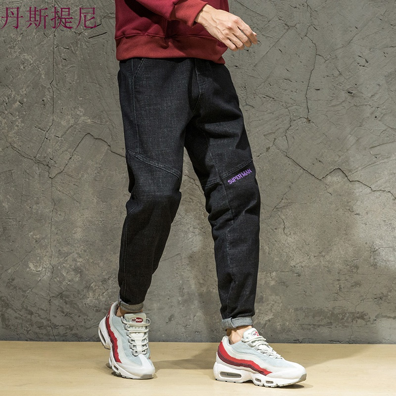 日系黑色牛仔裤男宽松大码长裤休闲小脚哈伦裤秋季个性刺绣潮裤子