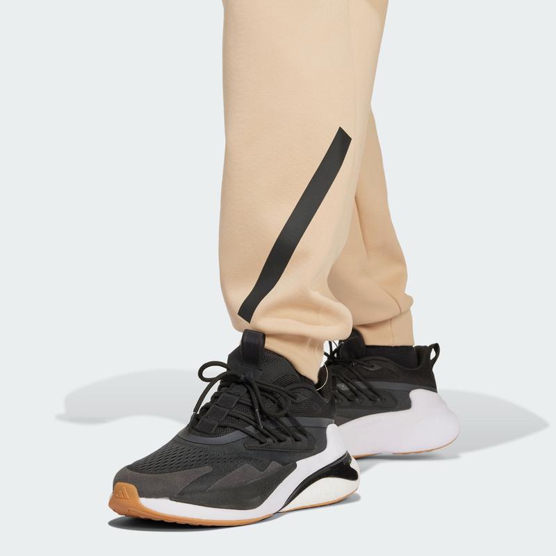 阿迪达斯(adidas)adidas运动长裤男款保暖拼接宽松训练比赛双层防高清大图