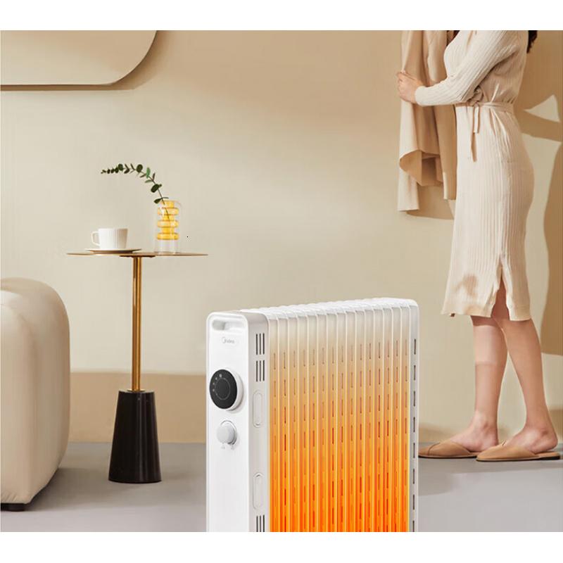 美的(Midea)电热油汀取暖器家用电暖器节能省电干衣加湿自动恒温立体散热机械式[3000W17片]高清大图