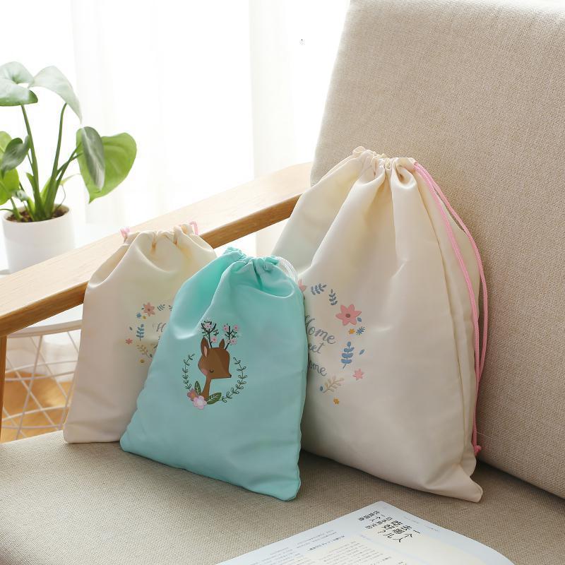 家柏饰(CORATED)防水布袋子旅行收纳套装内衣收纳包行李箱衣服整理包抽绳束口袋 蓝色中号