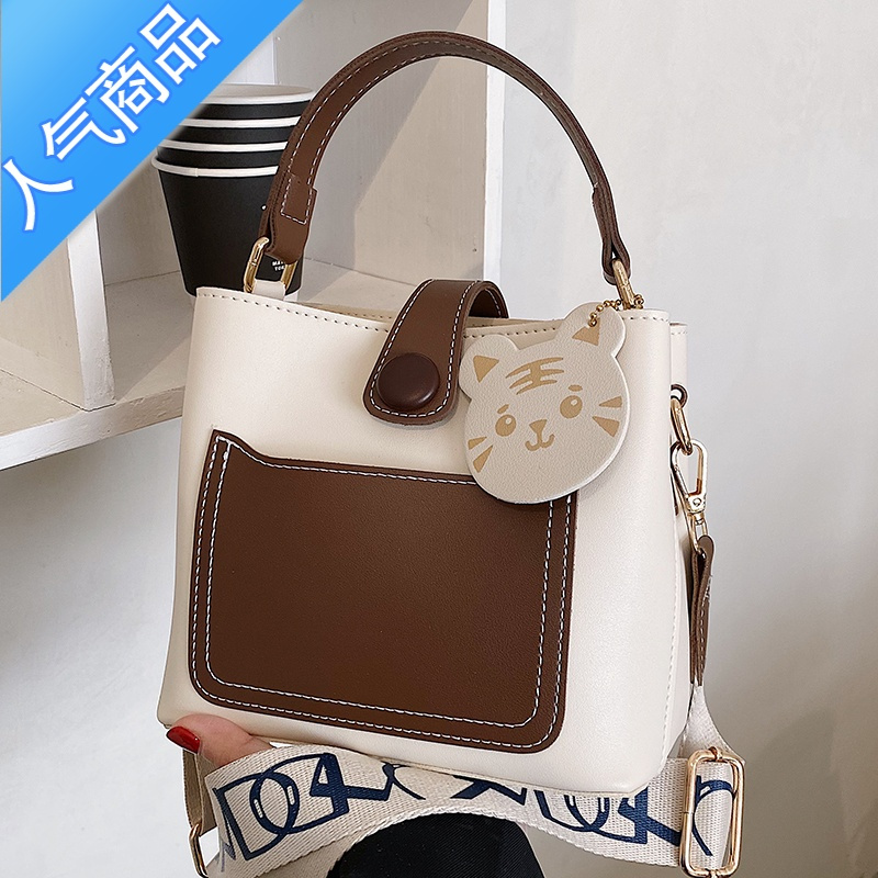 封后cherreskiemi香港包包女青年休闲纯色单肩斜挎包小众轻奢水桶包