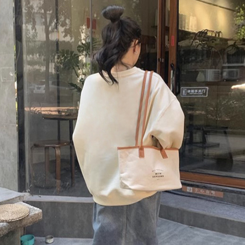 唐狮秋季新款女圆领前胸爱心图案卫衣百搭上衣简约潮流韩系