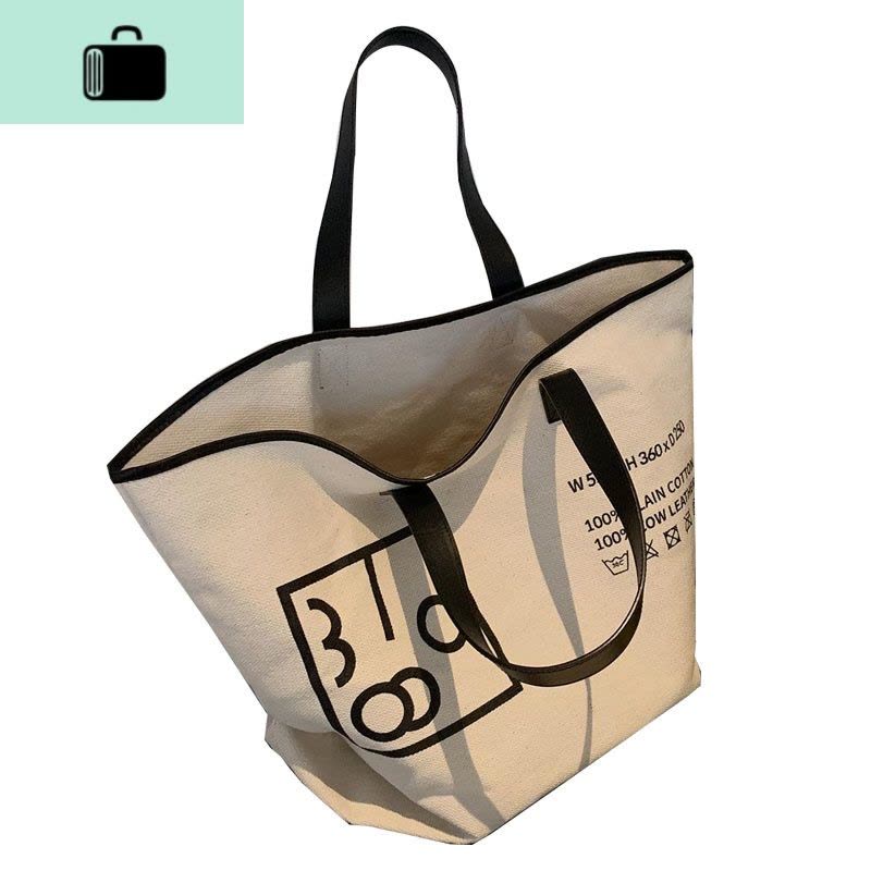 包包女2020新款单肩帆布包慵懒风布袋包手提字母包NEW LAKE 本白色女手包图片