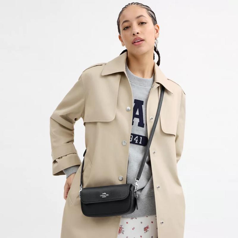 COACH蔻驰女款通用防水透气包附可调连帽与可拆裙时尚实用