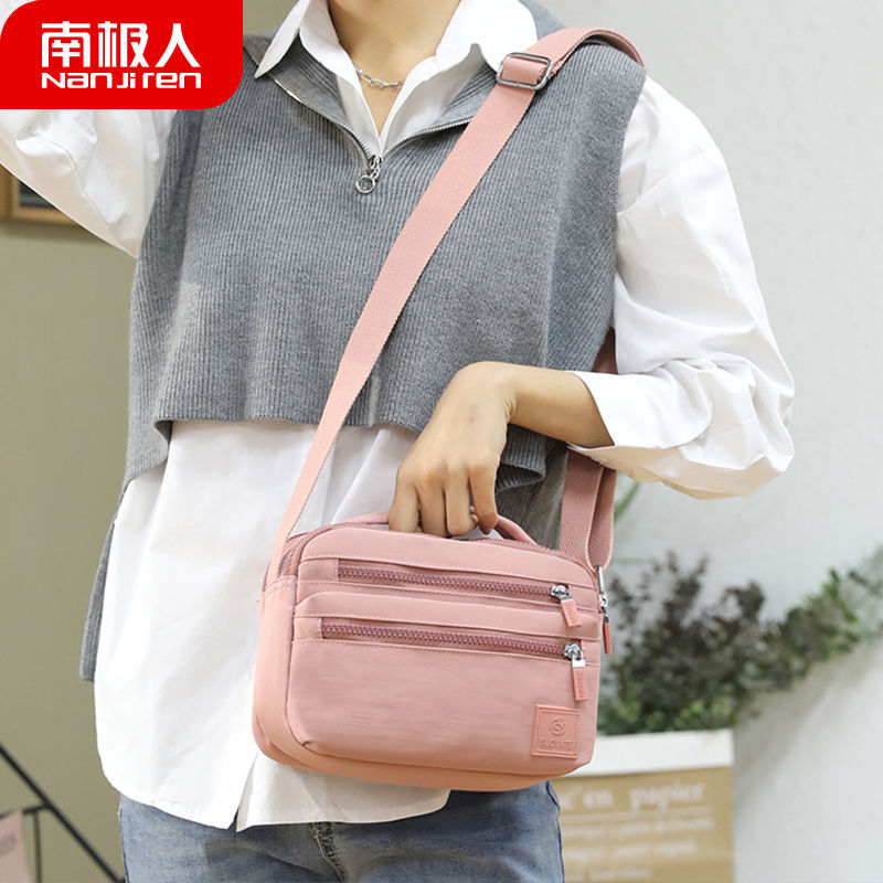 2021新款女士多层单肩斜挎包休闲防水尼龙布妈妈包生意收钱帆布包高清大图