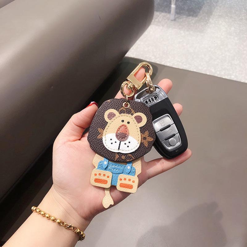 新款经典老花小狮子挂件法斗犬钥匙链狮子汽车钥匙扣时尚包包挂饰 老花摇头小狮子+普通扣(不配马蹄扣)