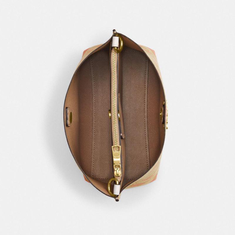 蔻驰coachmollie心形印花签名帆布时尚百搭简约休闲22英寸水桶包女士