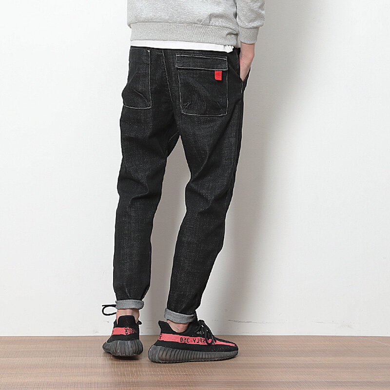 春季日系黑色牛仔裤男士大码韩版修身小脚哈伦长裤潮流显瘦男裤子黑色