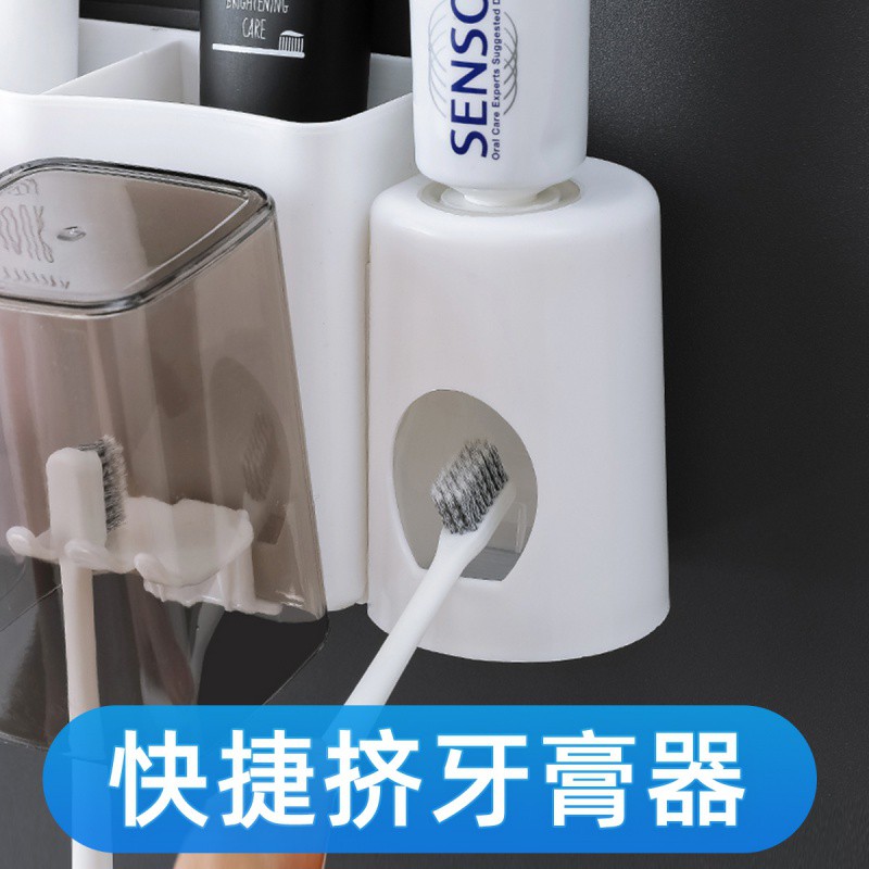 免打孔牙刷置物架 自动挤牙膏器套装 卫生间挂墙吸壁式漱口杯 三维工匠 透明杯两口牙刷架高清大图