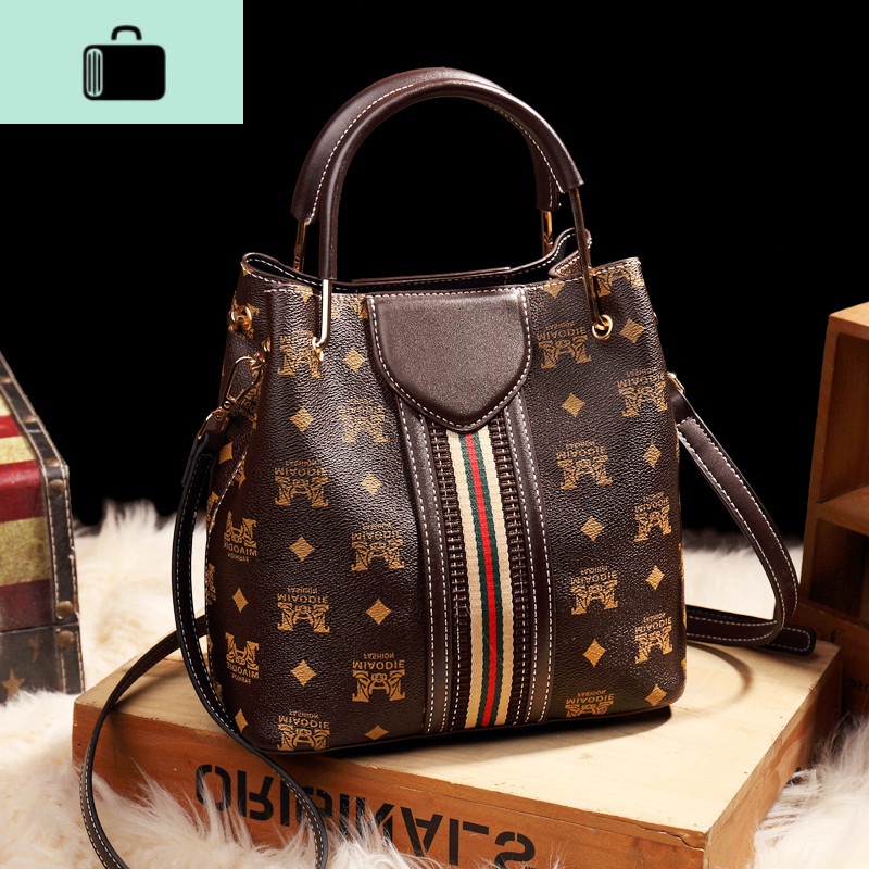 真皮包包女2020新款网红时尚大气手提水桶包百搭单肩斜跨包女包NEW LAKE 咖啡色 咖啡色