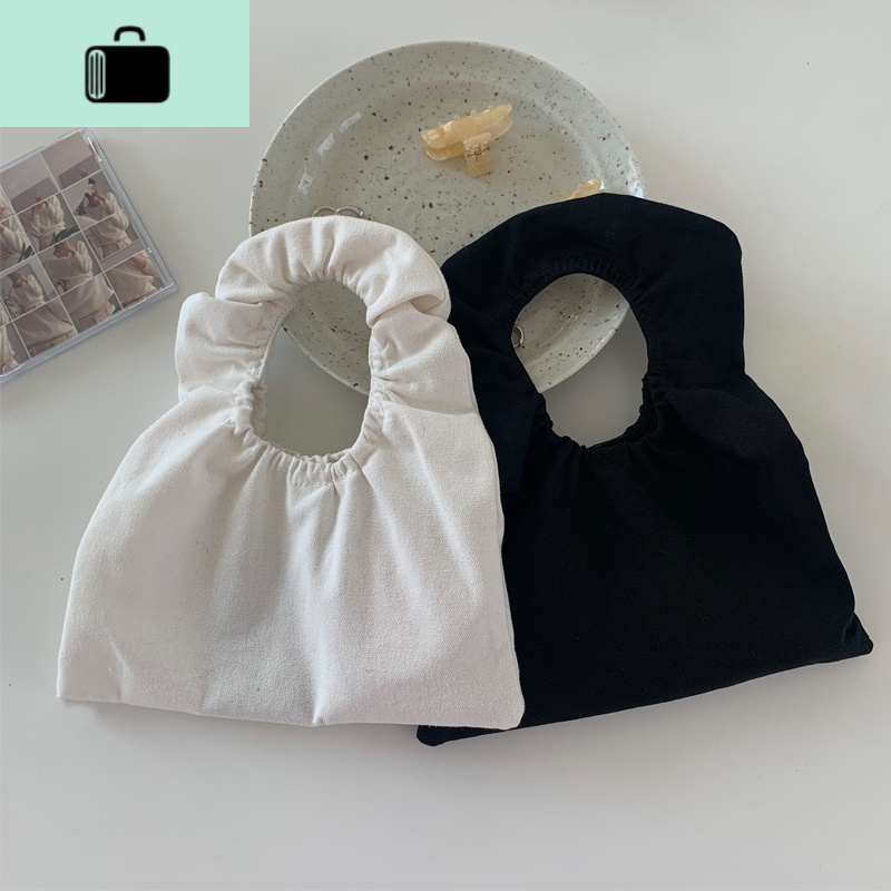 夏季新款韩版ins风网红时尚褶皱荷叶边手提饺子包帆布手拎包女潮NEW LAKE女斜挎包