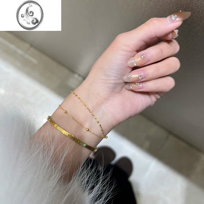 JiMi通体钛钢ins小众设计包金手链女精致叠戴手环轻奢气质百搭首饰图片